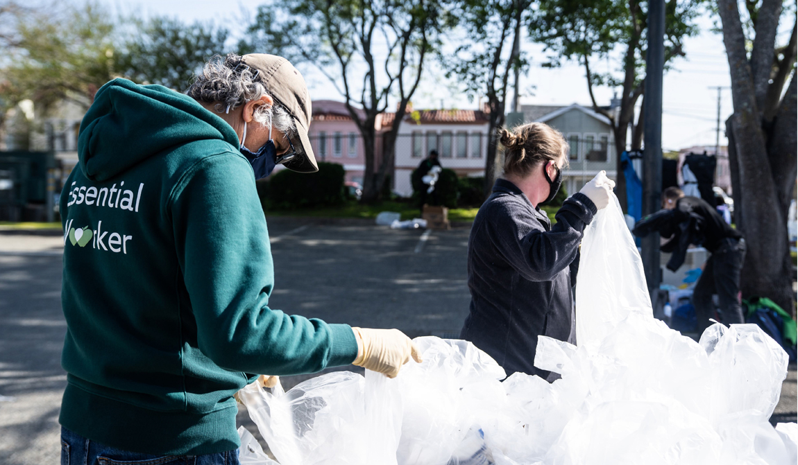 Food Bank staff packs bags