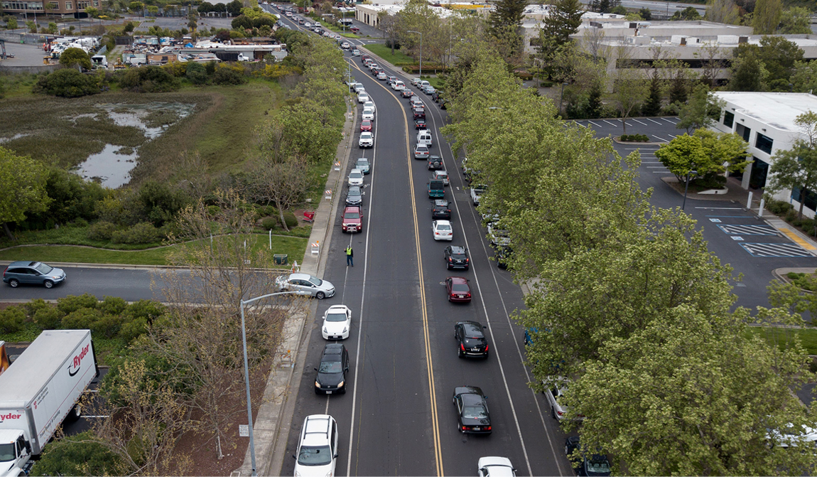 Cars wait for food pantry