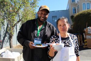 Food Bank Community Coordinator Marcel and Su Ming are all smiles for lunch